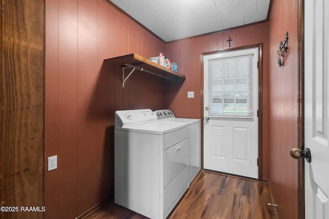 307 Bertrand Rd, Opelousas, LA 70570 - laundry room with washer and dryer and dark wood-style floors