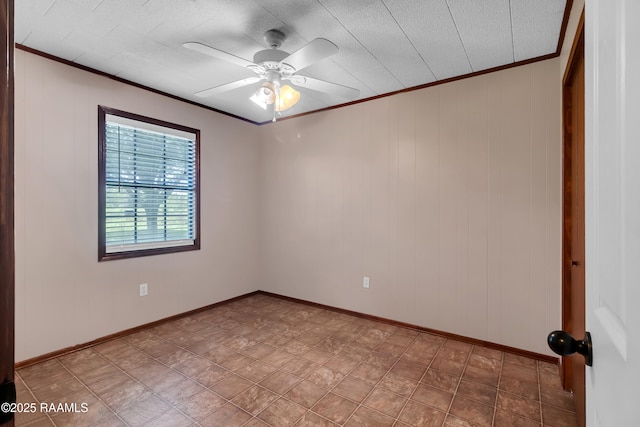 307 Bertrand Rd, Opelousas, LA 70570 - empty room featuring crown molding, ceiling fan, and wooden walls