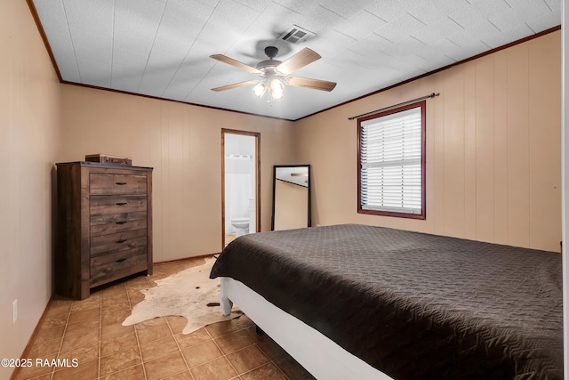 307 Bertrand Rd, Opelousas, LA 70570 - bedroom featuring crown molding, light tile patterned flooring, connected bathroom, and ceiling fan