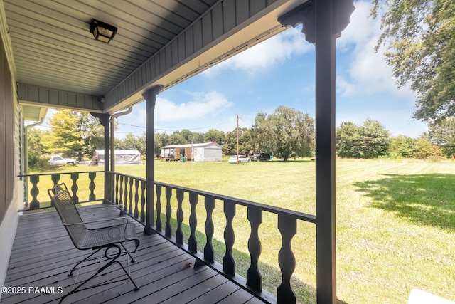 307 Bertrand Rd, Opelousas, LA 70570 - wooden porch with a lawn
