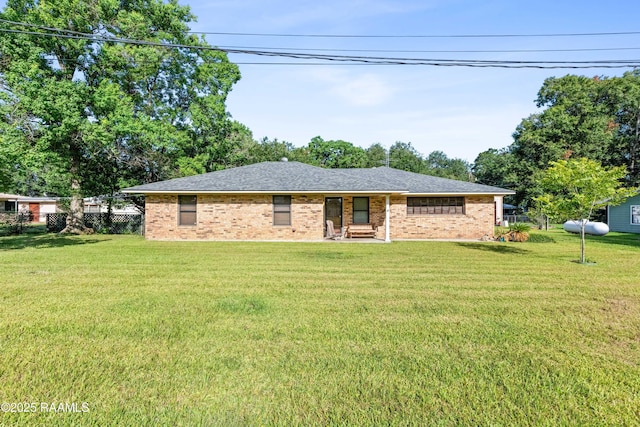 1912 Mimosa St, Abbeville, LA 70510 - single story home with brick siding and a shingled roof