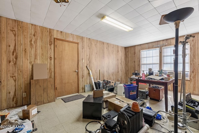 1912 Mimosa St, Abbeville, LA 70510 - miscellaneous room with wood walls and tile patterned floors