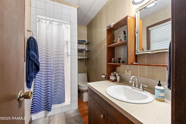 1912 Mimosa St, Abbeville, LA 70510 - bathroom with vanity, a shower with shower curtain, and tile patterned flooring