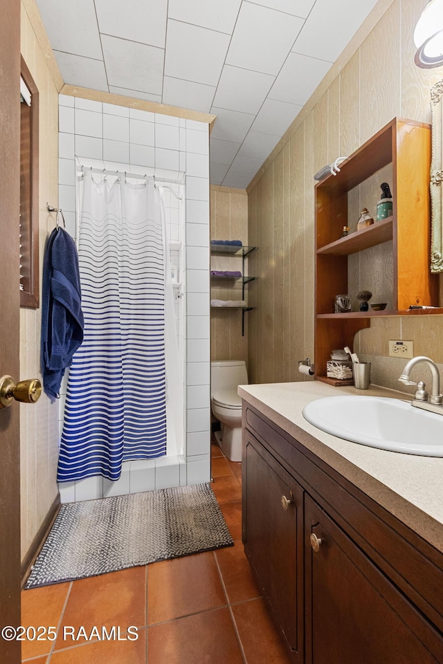 1912 Mimosa St, Abbeville, LA 70510 - bathroom featuring tile patterned floors, vanity, and a shower with curtain