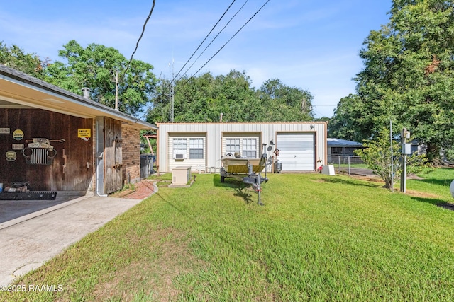 1912 Mimosa St, Abbeville, LA 70510 - view of front of home featuring a detached garage and an outdoor structure
