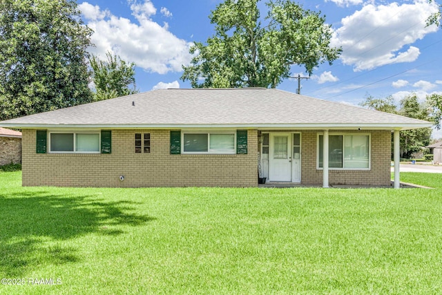 101 Barrow St, New Iberia, LA 70563 - ranch-style home featuring brick siding, a front lawn, and roof with shingles