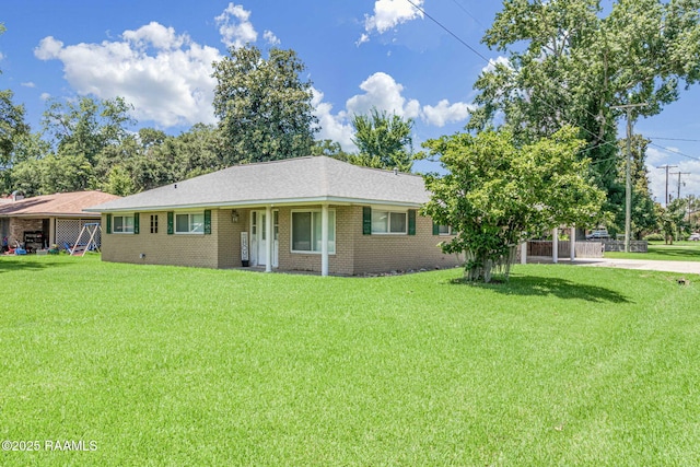 101 Barrow St, New Iberia, LA 70563 - single story home with a front lawn and brick siding