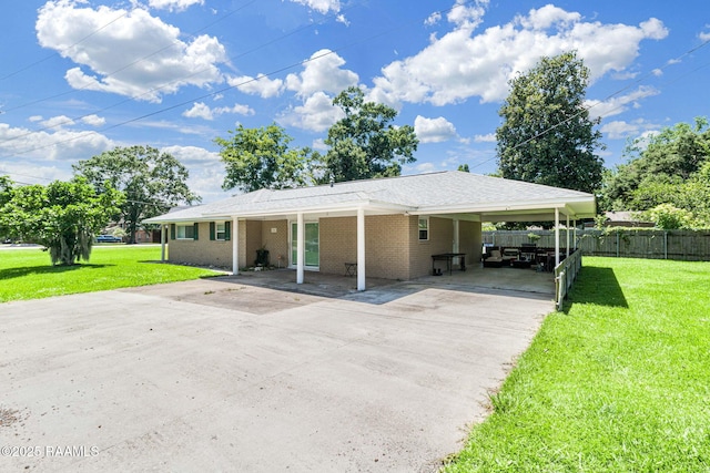 101 Barrow St, New Iberia, LA 70563 - single story home featuring driveway, a carport, and brick siding