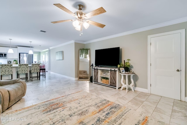 101 Barrow St, New Iberia, LA 70563 - living area with ornamental molding and a ceiling fan