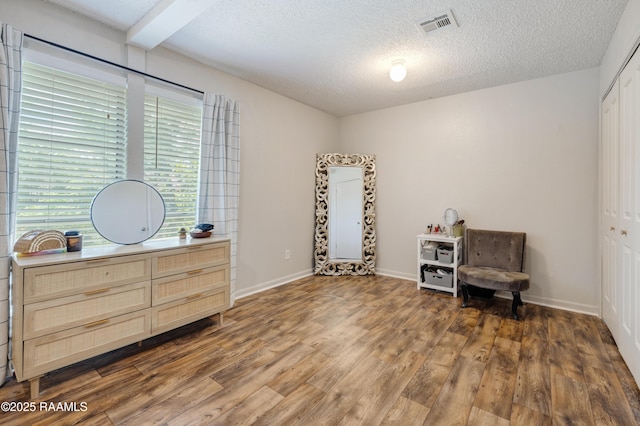 26 Morning Glory Sq, Lafayette, LA 70507 - living area with wood finished floors and a textured ceiling