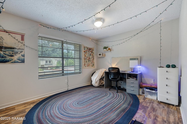 26 Morning Glory Sq, Lafayette, LA 70507 - office with a textured ceiling and wood finished floors