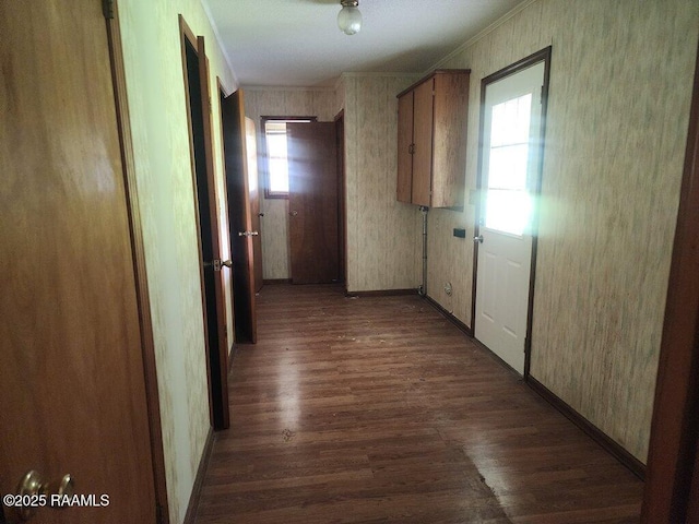 4702 Daspit Rd, New Iberia, LA 70563 - hallway featuring wood finished floors, ornamental molding, and wallpapered walls