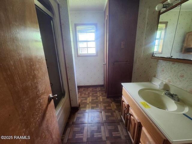 4702 Daspit Rd, New Iberia, LA 70563 - bathroom with wallpapered walls, vanity, and ornamental molding
