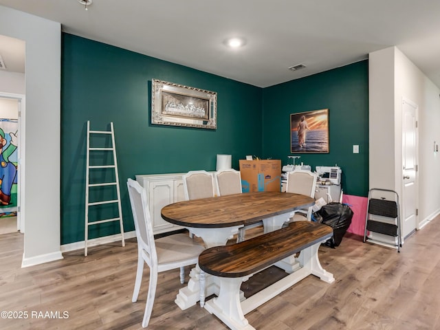 107 Southern Oak Dr, Lafayette, LA 70507 - dining room featuring light wood-type flooring and baseboards
