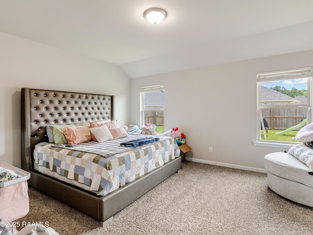 107 Southern Oak Dr, Lafayette, LA 70507 - carpeted bedroom featuring vaulted ceiling and multiple windows