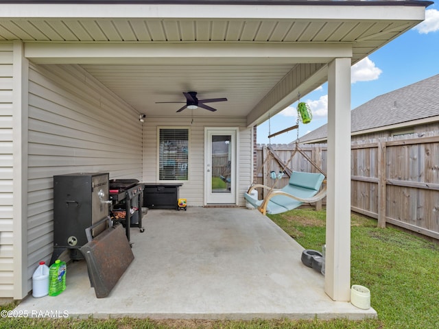 107 Southern Oak Dr, Lafayette, LA 70507 - fenced backyard with a ceiling fan, a patio, and a grill