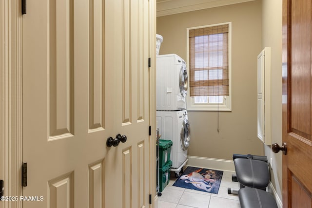 104 Littleton Xing, Lafayette, LA 70508 - laundry room featuring stacked washer / drying machine, crown molding, and tile patterned flooring