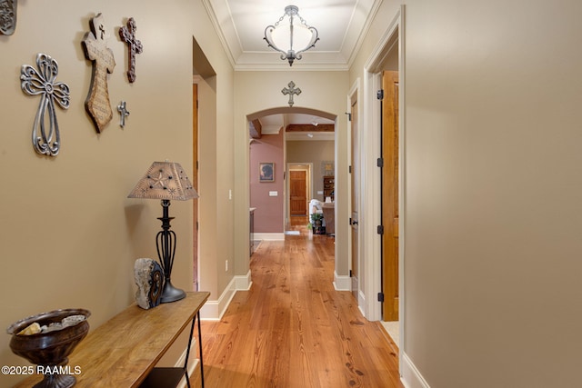 104 Littleton Xing, Lafayette, LA 70508 - corridor with arched walkways, light wood finished floors, and crown molding