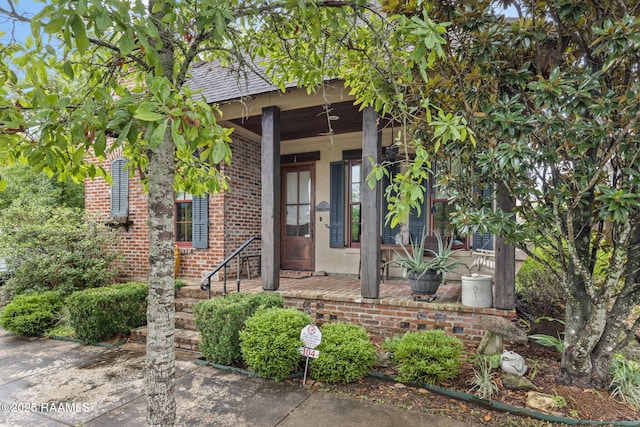 104 Littleton Xing, Lafayette, LA 70508 - entrance to property featuring covered porch and brick siding