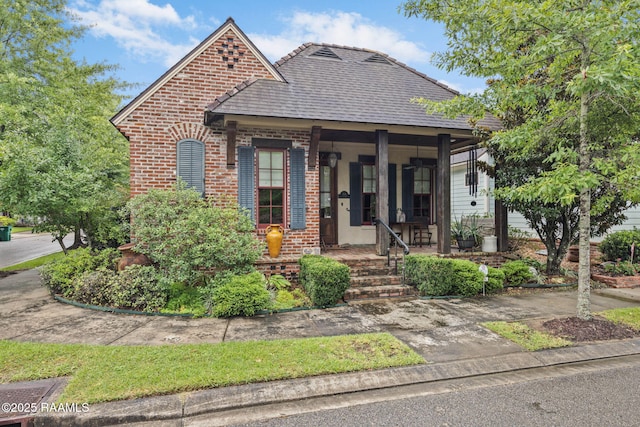 104 Littleton Xing, Lafayette, LA 70508 - view of front of property featuring a porch and brick siding