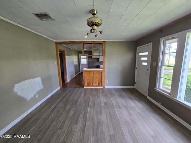 110 Judge Dr, Lafayette, LA 70507 - unfurnished dining area with ornamental molding and dark wood-style floors