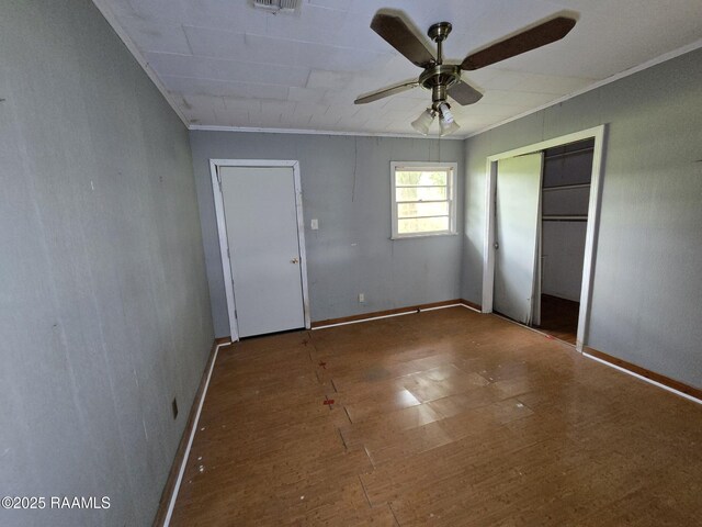 110 Judge Dr, Lafayette, LA 70507 - unfurnished bedroom with wood finished floors, a ceiling fan, and ornamental molding