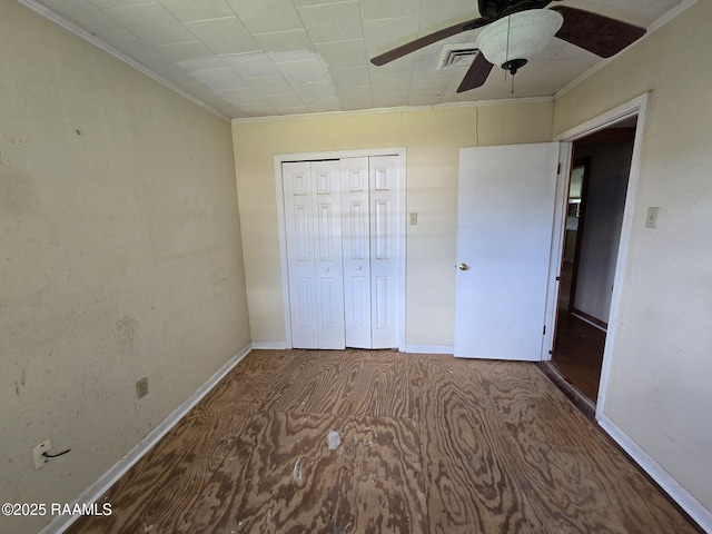 110 Judge Dr, Lafayette, LA 70507 - unfurnished bedroom with crown molding, a closet, and a ceiling fan