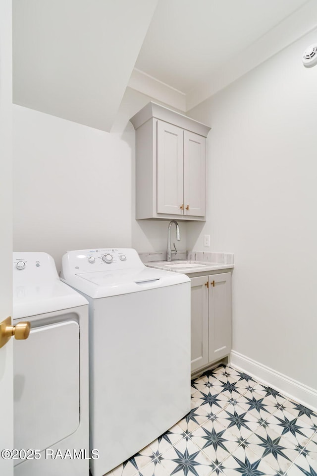 604 Channel Dr, Broussard, LA 70518 - laundry area with washing machine and clothes dryer, cabinet space, and light flooring