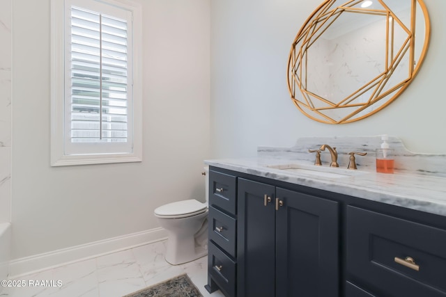 604 Channel Dr, Broussard, LA 70518 - bathroom featuring marble look tiles, vanity, and a tub to relax in