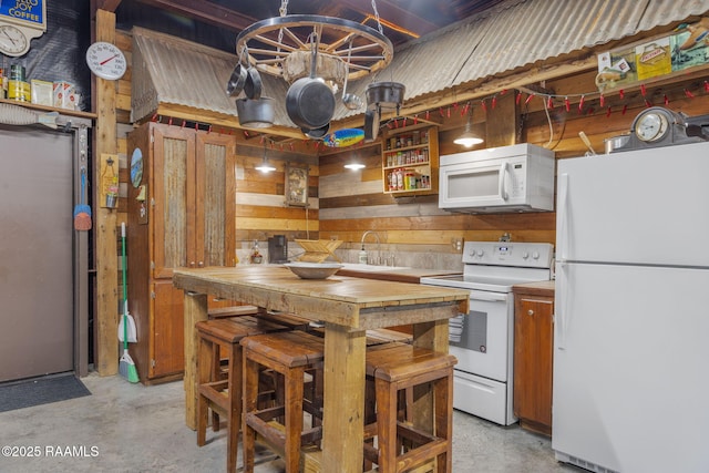 1054 Preston Broussard Rd, Arnaudville, LA 70512 - kitchen featuring white appliances, concrete flooring, and open shelves