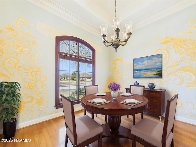 101 Lockeport Cir, Lafayette, LA 70508 - dining room featuring wallpapered walls, a chandelier, light wood finished floors, and crown molding