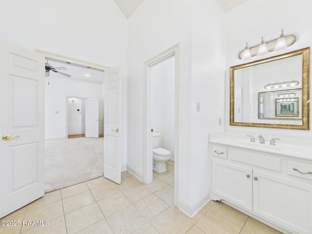 101 Lockeport Cir, Lafayette, LA 70508 - bathroom featuring vanity, tile patterned floors, a ceiling fan, and a towering ceiling