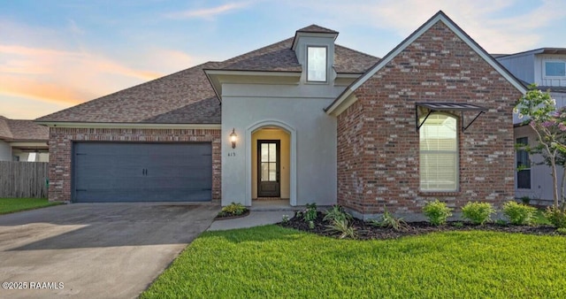 413 Easy Rock Landing Dr, Broussard, LA 70518 - view of front of property with a garage, driveway, brick siding, and stucco siding