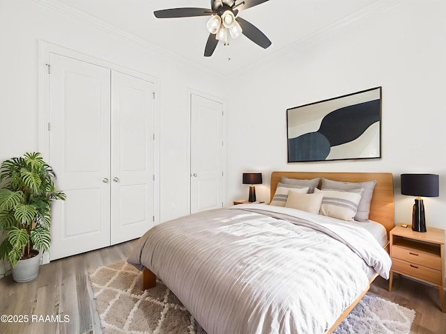 207 Timber Mill St, Lafayette, LA 70508 - bedroom featuring a closet, crown molding, wood finished floors, and ceiling fan