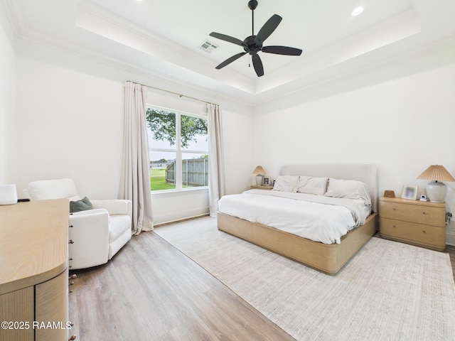 207 Timber Mill St, Lafayette, LA 70508 - bedroom featuring a tray ceiling, wood finished floors, crown molding, recessed lighting, and a ceiling fan