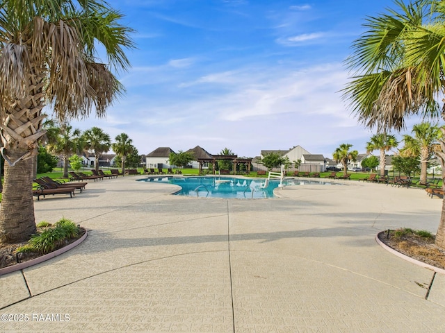 207 Timber Mill St, Lafayette, LA 70508 - community pool with a residential view and a patio area