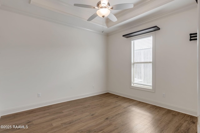 118 Rue Argenteuil, Lafayette, LA 70506 - empty room with a raised ceiling, ornamental molding, wood finished floors, and ceiling fan