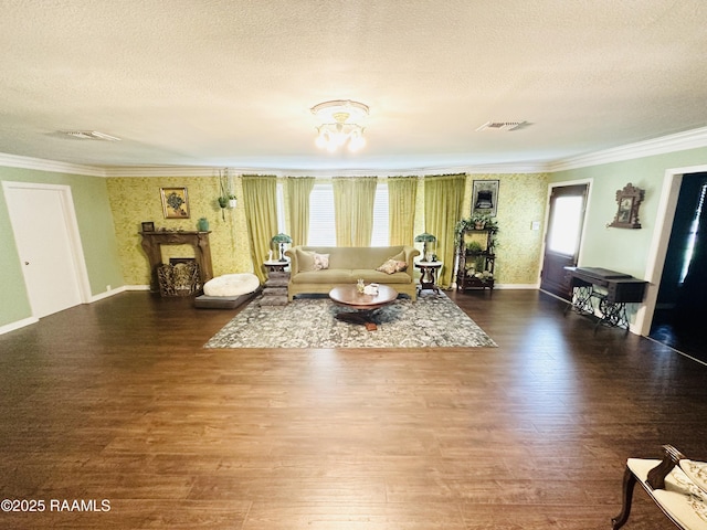 201 Edgewood Dr, Lafayette, LA 70503 - living area featuring ornamental molding, wood finished floors, and a textured ceiling