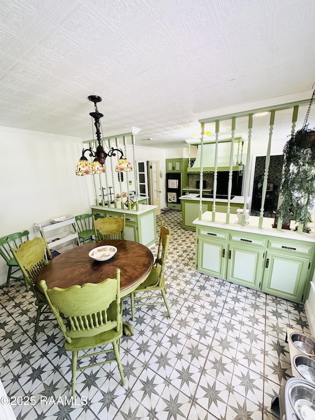 201 Edgewood Dr, Lafayette, LA 70503 - dining room with light floors and a chandelier