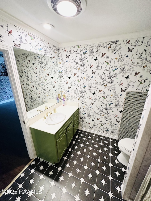 201 Edgewood Dr, Lafayette, LA 70503 - bathroom with vanity, tile patterned floors, wallpapered walls, and ornamental molding
