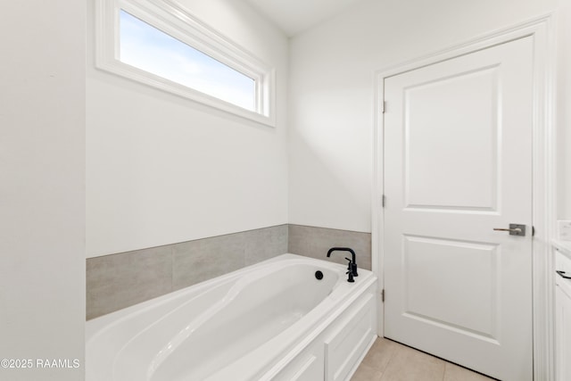 222 Alpine Dr, Lafayette, LA 70506 - bathroom with a garden tub and tile patterned floors