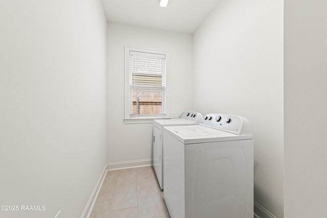 222 Alpine Dr, Lafayette, LA 70506 - laundry area with washer and dryer and light tile patterned floors