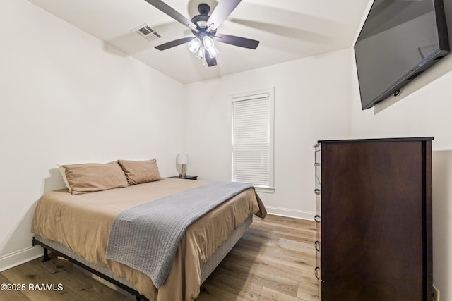222 Alpine Dr, Lafayette, LA 70506 - bedroom with light wood finished floors and a ceiling fan