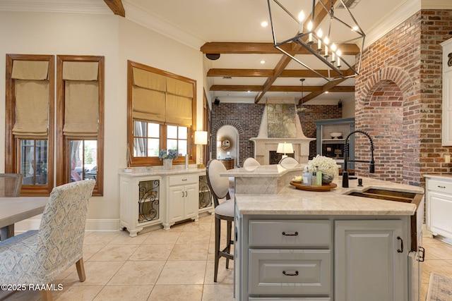 101 Enclave Ct, Lafayette, LA 70508 - kitchen with beam ceiling, white cabinets, open floor plan, light stone counters, and recessed lighting