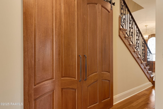 101 Enclave Ct, Lafayette, LA 70508 - staircase with wood finished floors and baseboards