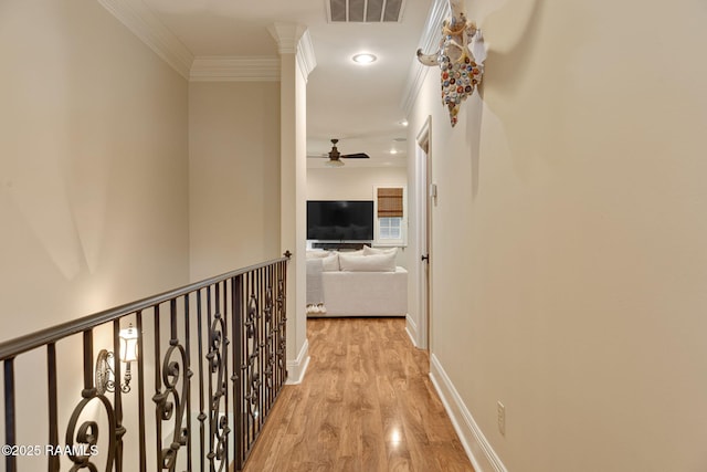 101 Enclave Ct, Lafayette, LA 70508 - corridor featuring light wood-style floors, ornamental molding, and recessed lighting