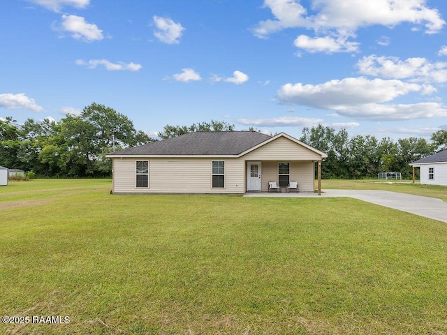 1166 Madeline Hts, Breaux Bridge, LA 70517 - view of front of property with a patio area, a front yard, and driveway