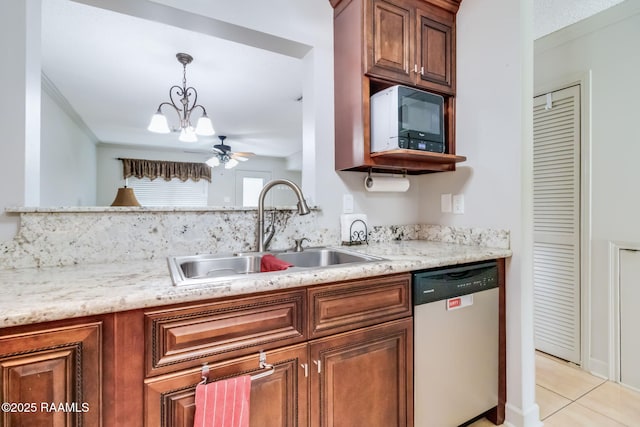 209 Long Plantation Unit A, Lafayette, LA 70508 - kitchen featuring dishwasher, brown cabinetry, light tile patterned floors, and decorative light fixtures