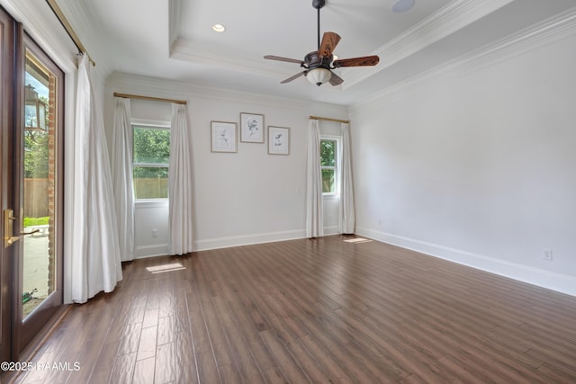 506 Terrell Ct, New Iberia, LA 70563 - unfurnished room with healthy amount of natural light, ceiling fan, dark wood-style floors, a raised ceiling, and crown molding