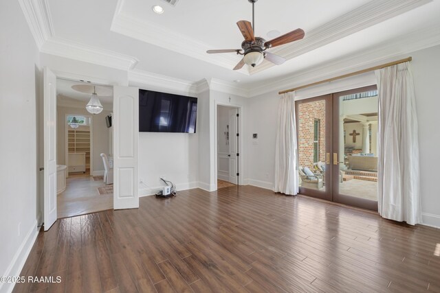 506 Terrell Ct, New Iberia, LA 70563 - unfurnished living room featuring french doors, ceiling fan, wood finished floors, a raised ceiling, and ornamental molding